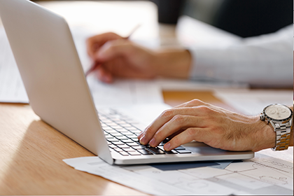 person using laptop computer